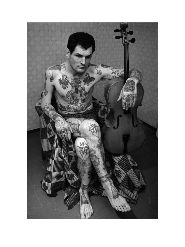 Sergei Vasiliev's photographs of Russian Criminal Tattoos are part of a 